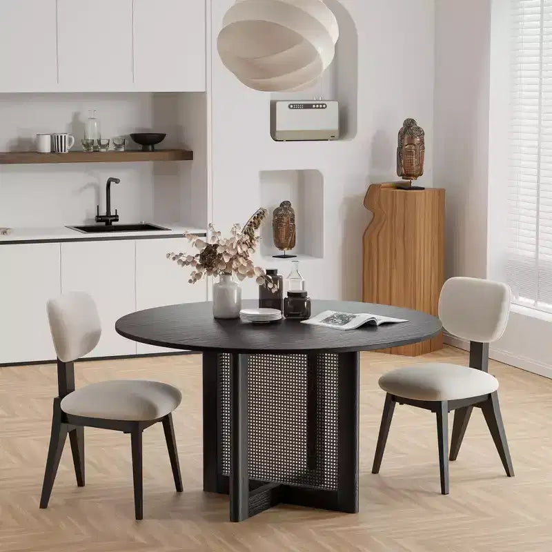 Table à manger ronde noire avec pieds en rotin, 6 places